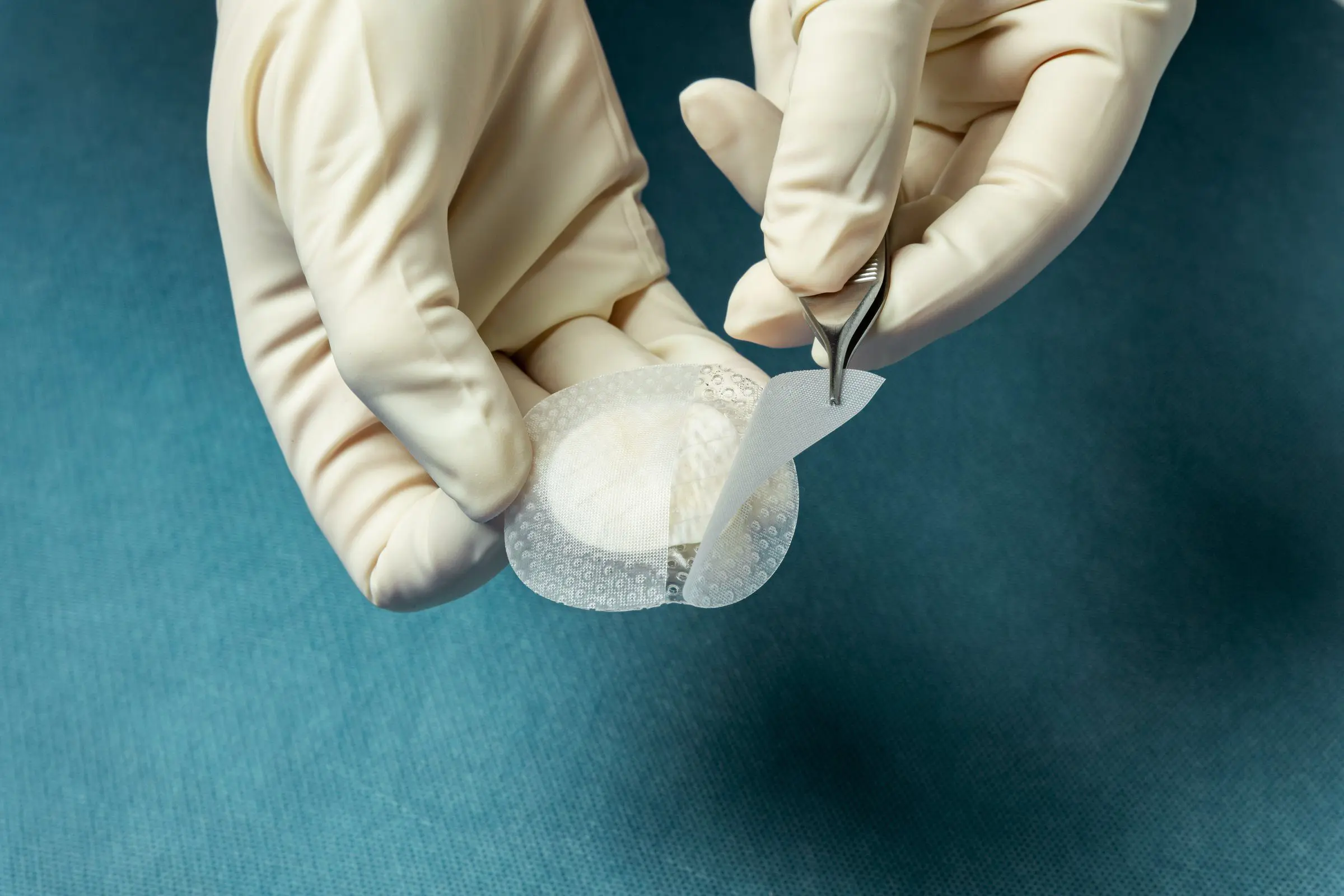 Kerecis MariGen product being applied to wound